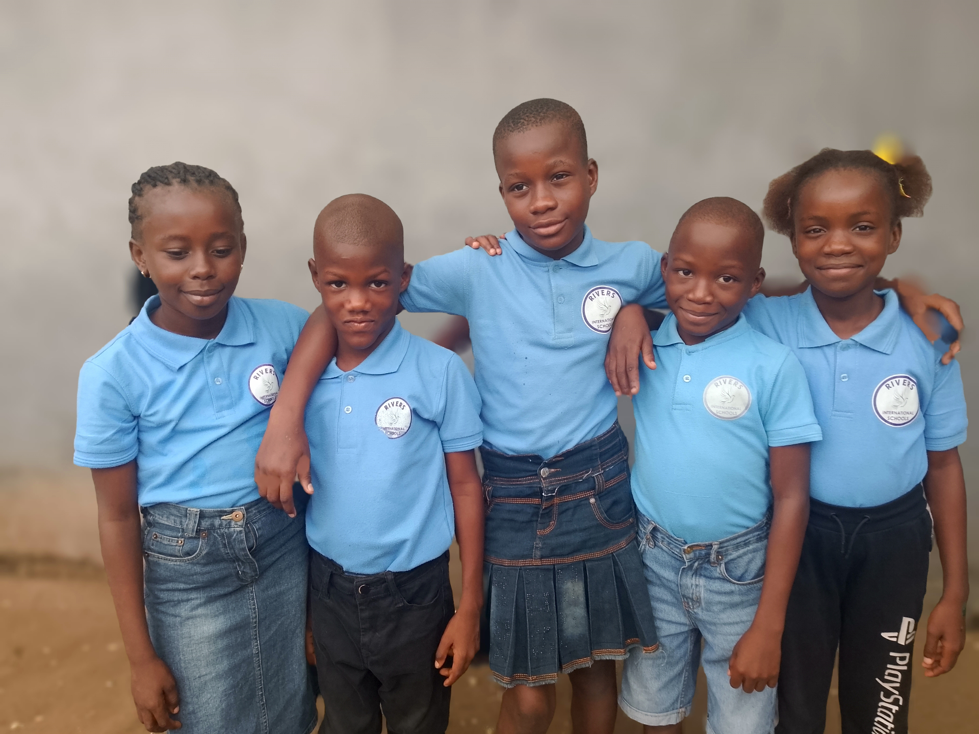 Rivers International School students in blue uniform